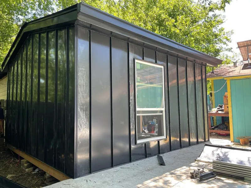 Black standing seam metal wall panels for Roof Inspection in Binghamton