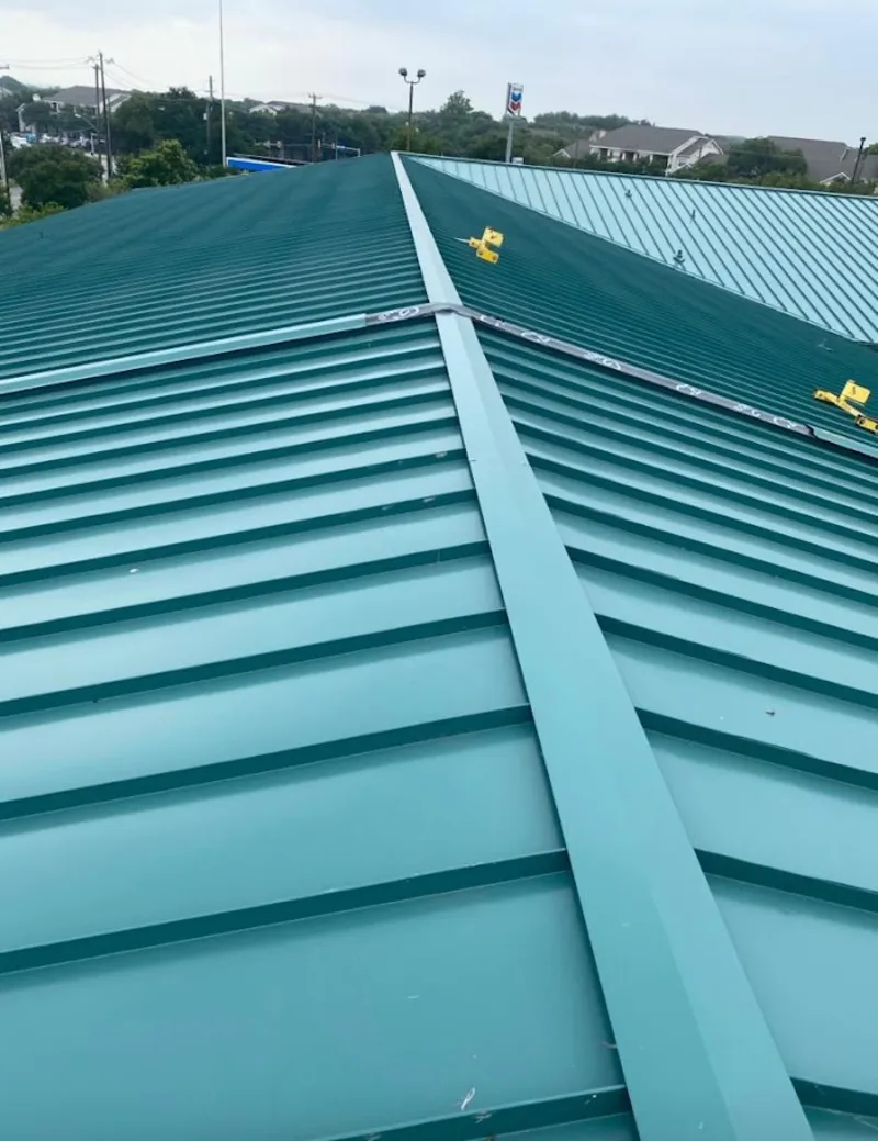 Green commercial metal roof ridge and valley for Metal Roof Repair in Binghamton